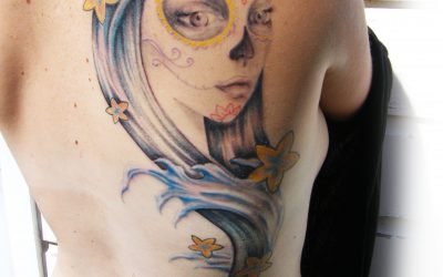 Half-Back Tattoo with Waves and Floral Sugar Skull Lady