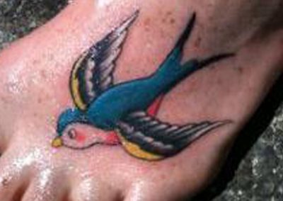 Swallow Foot Tattoo